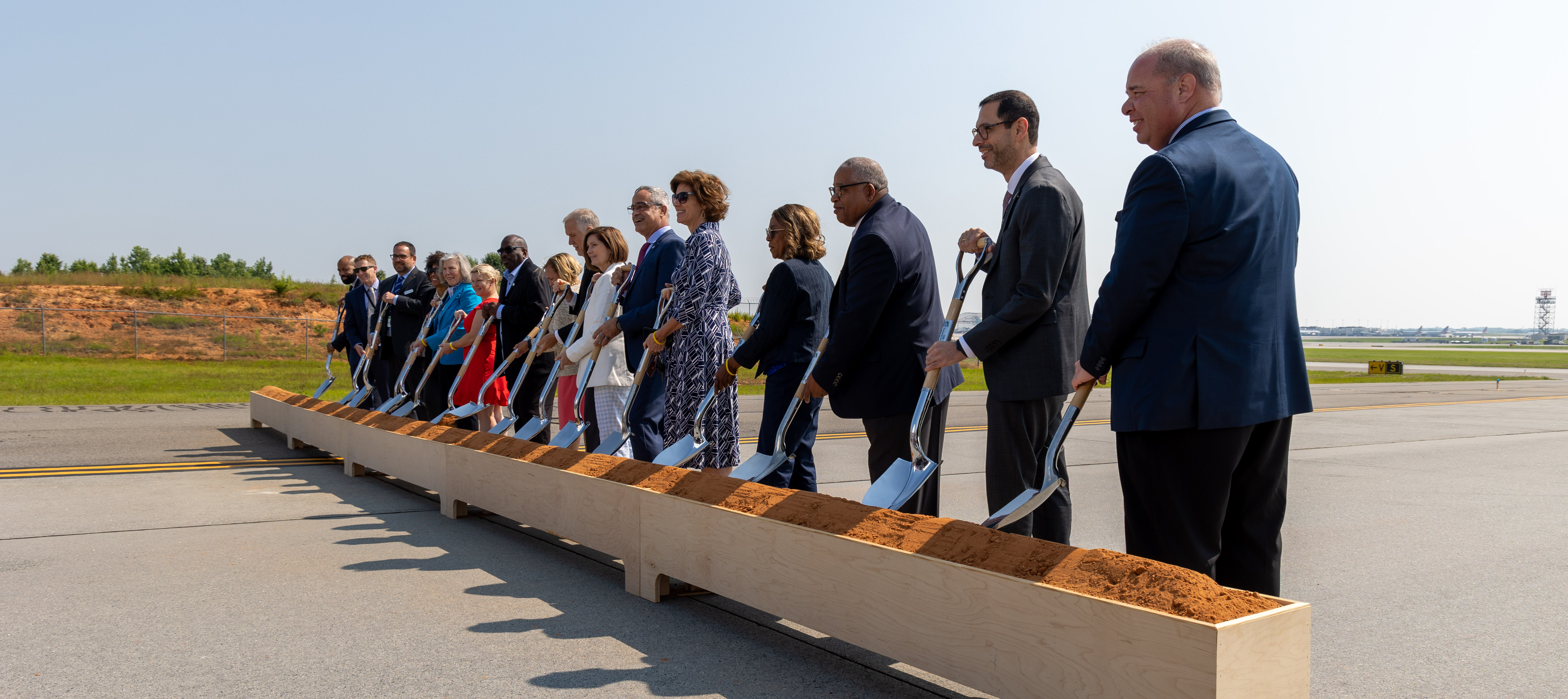 Groundbreaking Ceremony for Fourth Parallel Runway, dirt turning