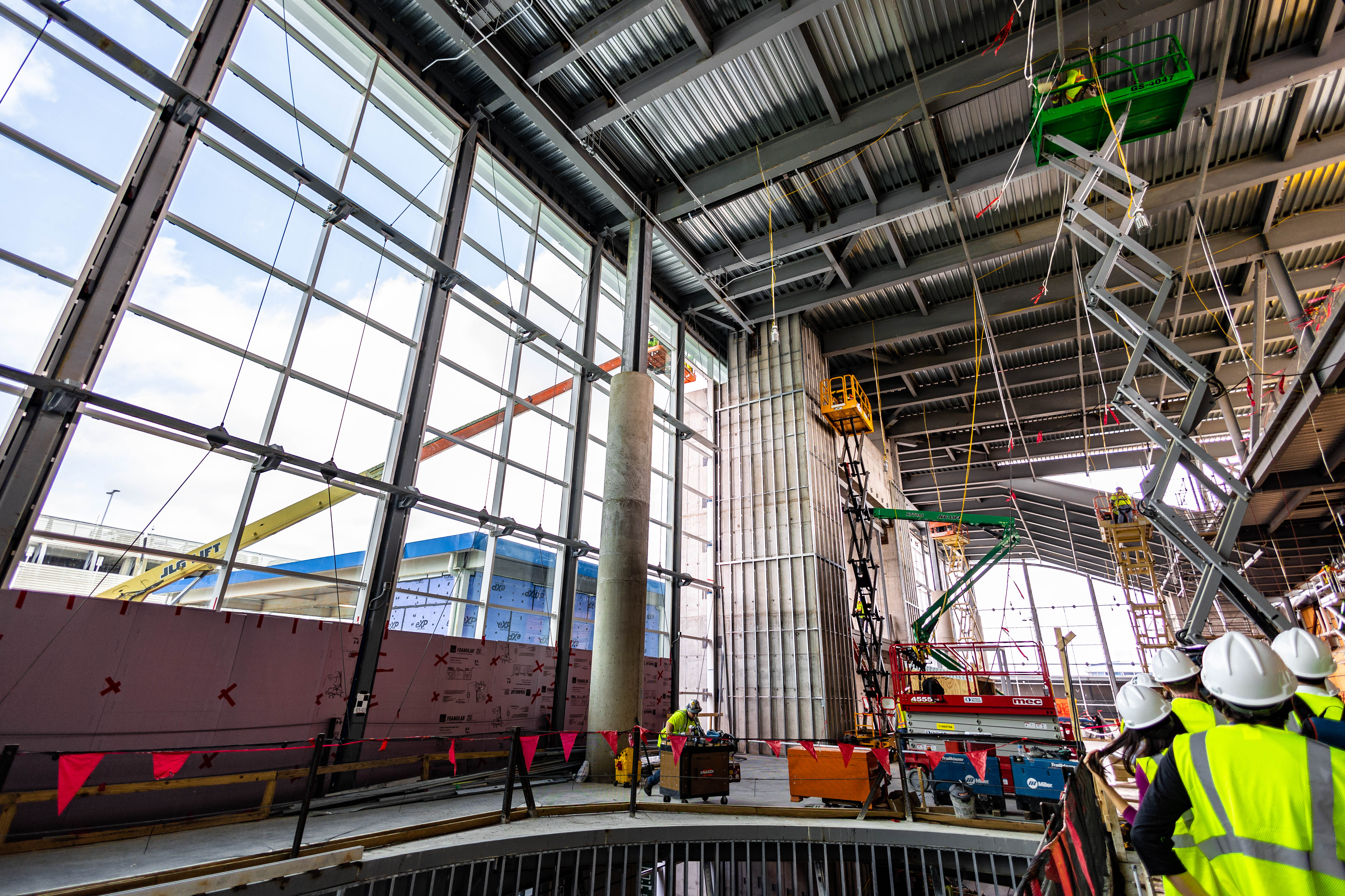 the large windows of the east terminal lobby take shape
